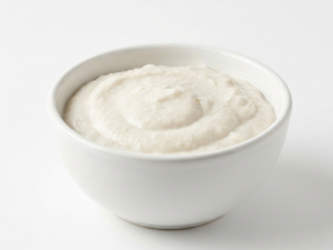 Coconut cream inside a white ceramic bowl