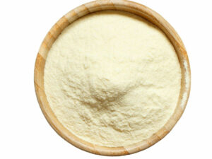 Top view of ivory-colored powder in a bowl.