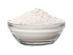 White powder in a transparent bowl.