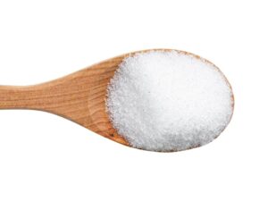 Top view of white sugar-like granules.