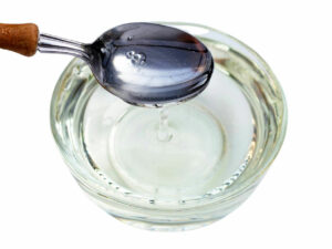 Top view of clear syrup in a bowl.