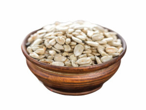 White seeds in a brown bowl