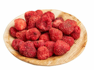 Dried strawberries on a wooden bowl