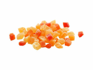 Dried papaya cubes in a heap.