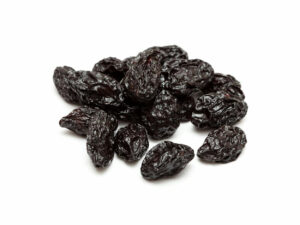 Dried prunes in a heap