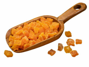 Dried mango dices in a scoop