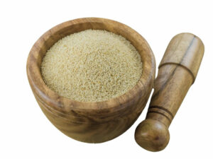 Top view of yellowish-brown powder in a bowl.