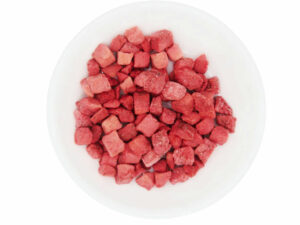 Top view of dried strawberry dices.