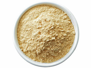 Top view of white-yellow powder in a bowl.