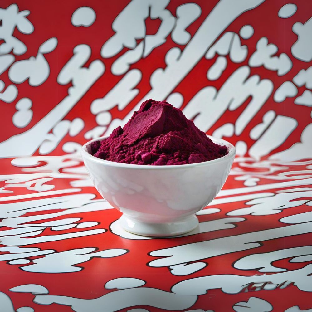 Beetroot powder on a white bowl with a pop art red & white background.