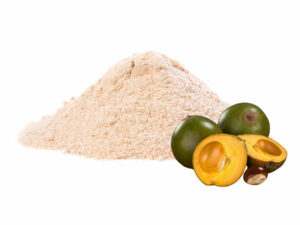 Beige colored powder beside lucuma fruit.