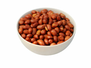 Golden, spanish peanuts in a bowl.