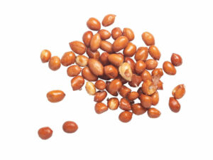 Top view of golden, salted peanuts.
