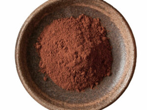 Top view of red-brown spice in a bowl.