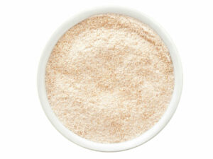 Top view of white and brown powder in a bowl.