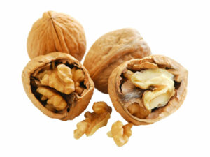 Three walnuts in their shell