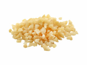 Peeled, cut almond nuts in a heap.