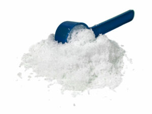 white powder displayed with a measuring spoon.