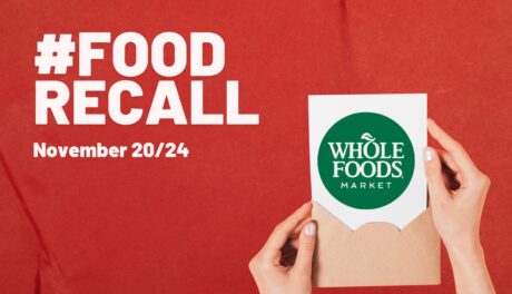 Red background with white letters that read Food Recall November 20/24. Two hands holding an open envelope with green and white circular logo on it that says Whole Foods Market