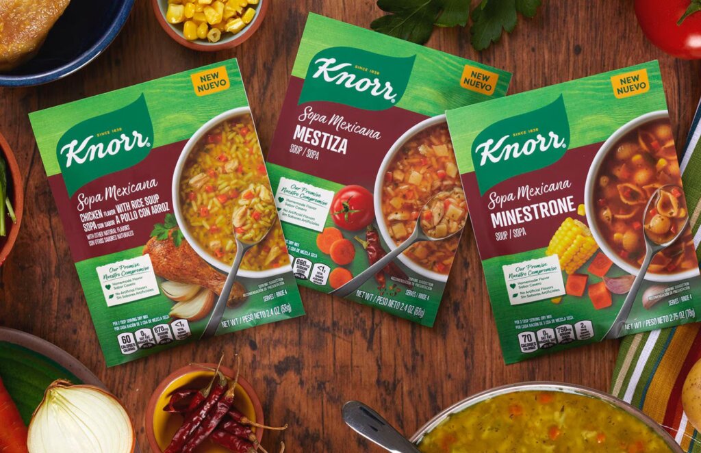 Three plated dishes featuring shrimp tacos, grain salad, pasta prepared with Knorr Premium Flavor Bases concentrated cooking ingredients