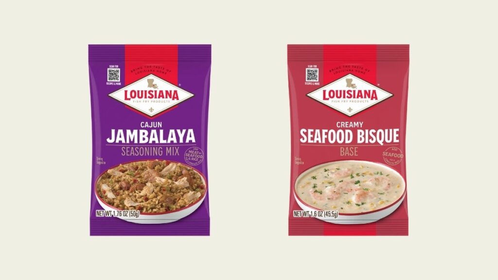 A pouch of Louisiana Fish Fry Creamy Seafood Bisque Base next to a bowl of shrimp bisque.