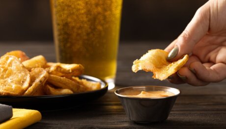 Beer battered potato waves by McCain served as crispy foodservice side, bulk supplier product