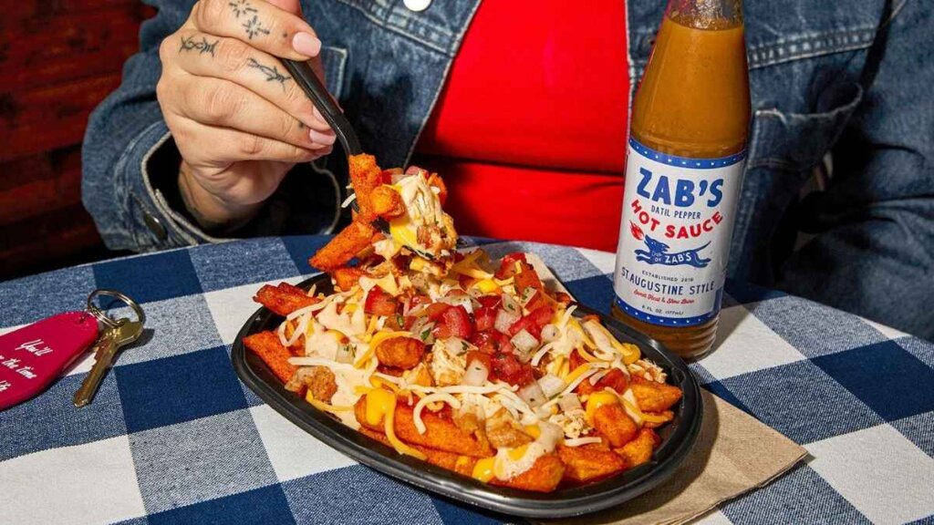 Taco Bell Zab's Chicken Ranch Nacho Fries featuring Zab's Ranch made with Datil Pepper St. Augustine Style Sauce, launched April 16, 2026, at $5.49 at participating locations