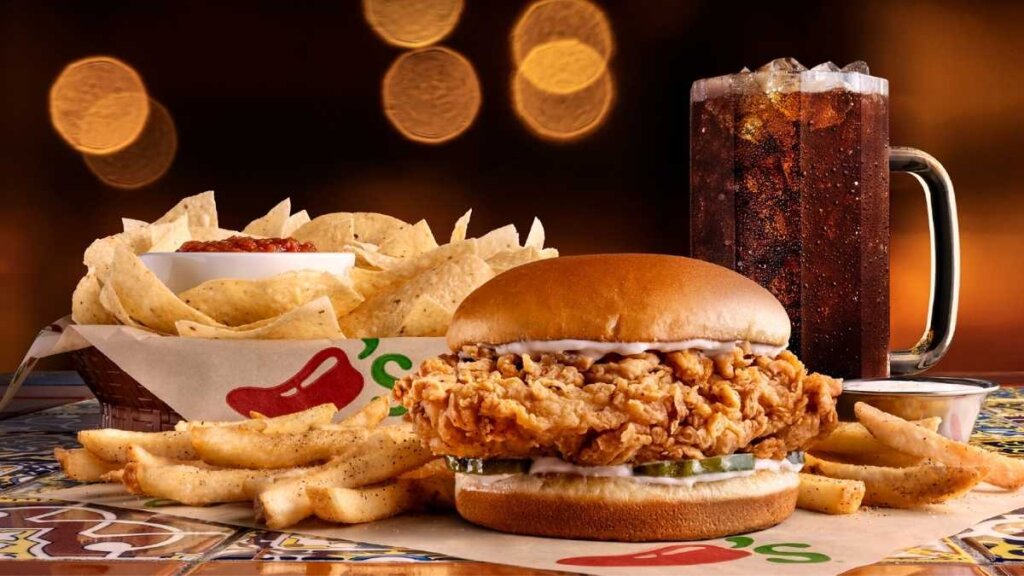 Chili's Big Crispy and Spicy Big Crispy chicken sandwiches on the $10.99 3 For Me menu with fries, bottomless chips and salsa, and unlimited fountain drink, launched nationwide April 14, 2026