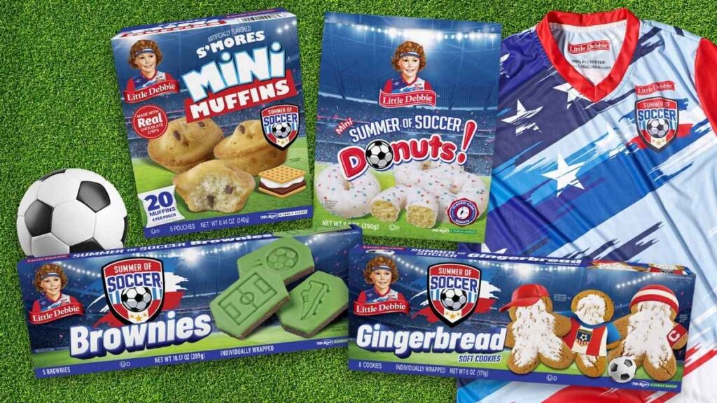 Little Debbie Summer of Soccer campaign launching June 2026 featuring new Soccer Brownies with field-green icing, Soccer S'mores Mini Muffins with chocolate chips and marshmallow bits, Soccer Mini Donuts with colorful sugar crystals, and Soccer Gingerbread Cookies at major retailers nationwide