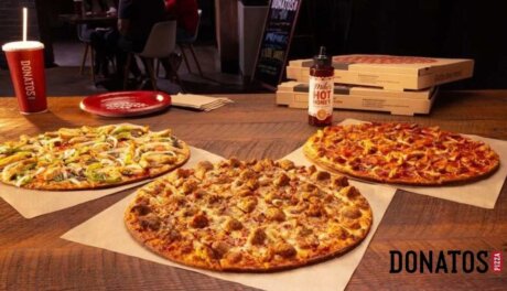 Donatos Triple Meat Alfredo pizza with bacon, sausage, and meatballs on Alfredo sauce