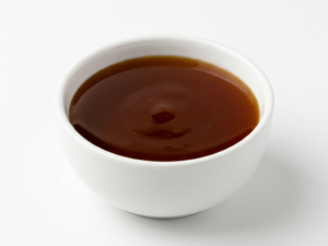 Bulk Yacon Syrup on a white ceramic bowl