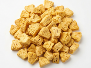 Freeze Dried Pineapple Chunks in a white marble table