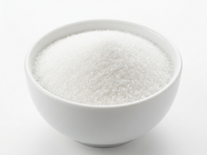 Bulk D-allulose on a white ceramic bowl
